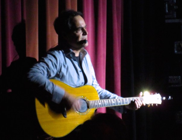 Neal, in a quiet acoustic moment, singing "Somber Days" from TESTIMONY.