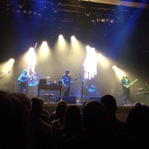 Cannot Erase Those Hands (Projected in the Background) Because They Are So Darn HUGE!