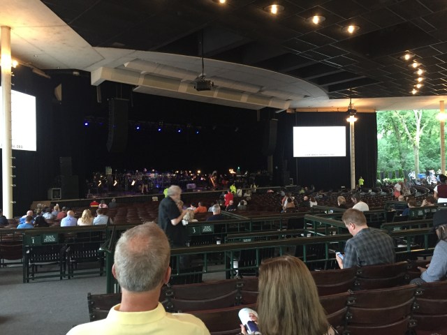 Landscape view of the Ravinia pavilion and stage from the back left of the pavilion. 